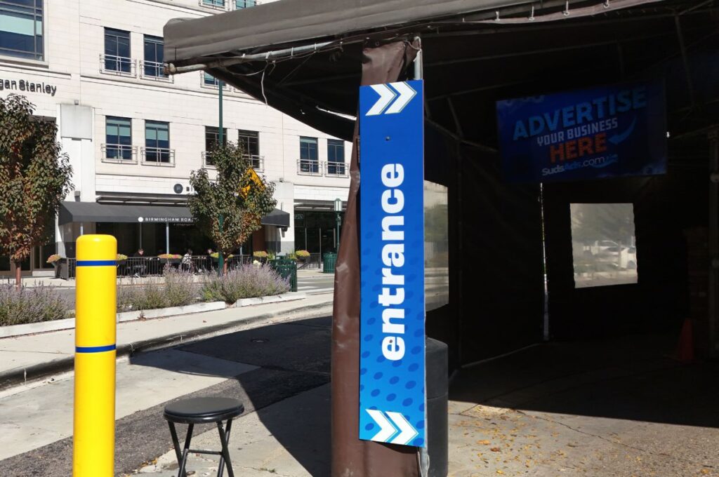 Jax Car Wash Birmingham entrance signage at exterior bay