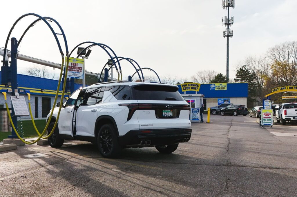 SUV using free vacuums at Jax Kar Wash Southfield