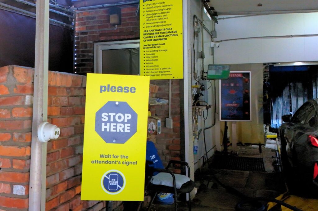 Jax Car Wash Birmingham interior stop here signage