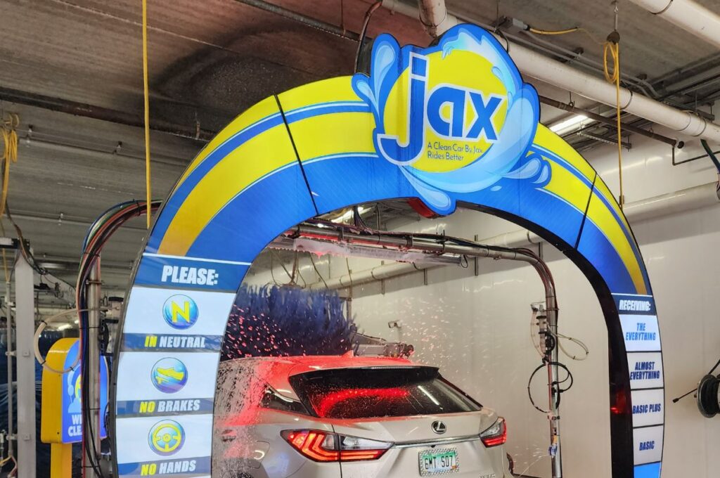 Jax automatic car wash tunnel entrance with brushes
