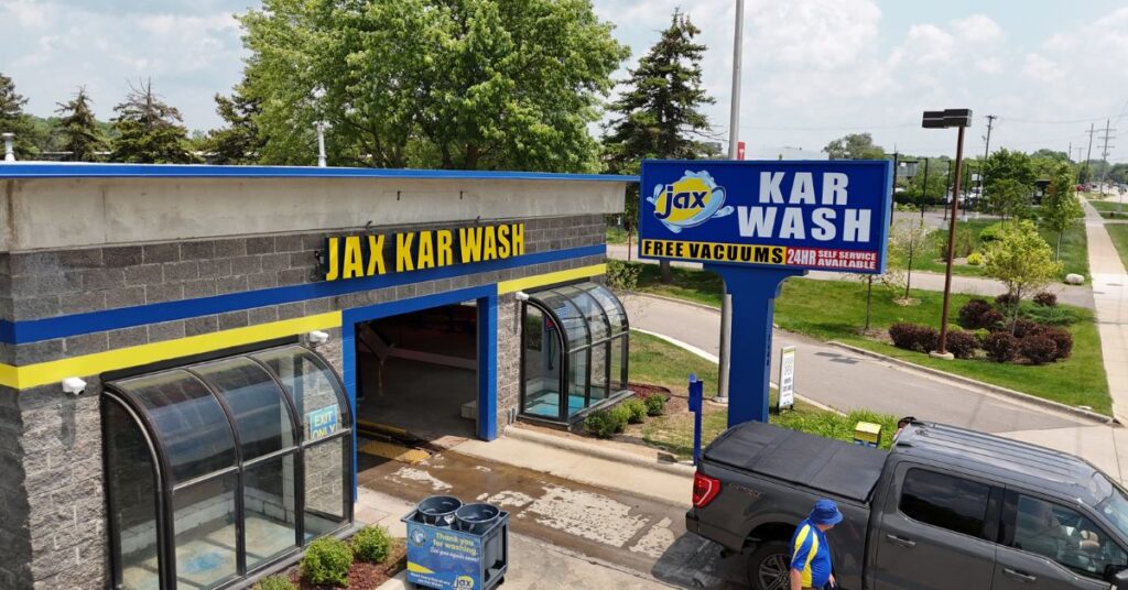 Jax Kar Wash entrance and sign with free vacuums