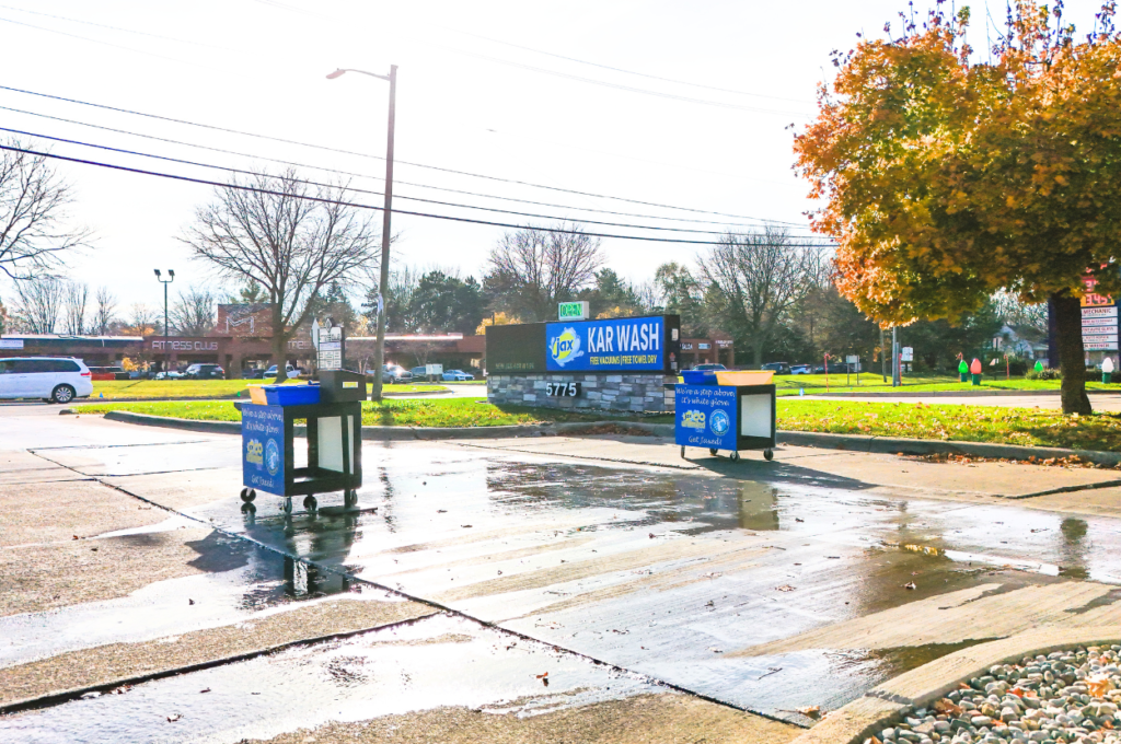 Jax Kar Wash entrance with signage on sunny day.
