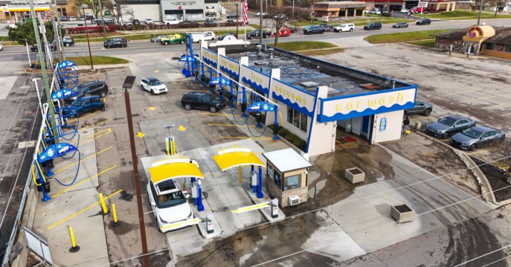 Aerial view of Jax Kar Wash with vacuums.