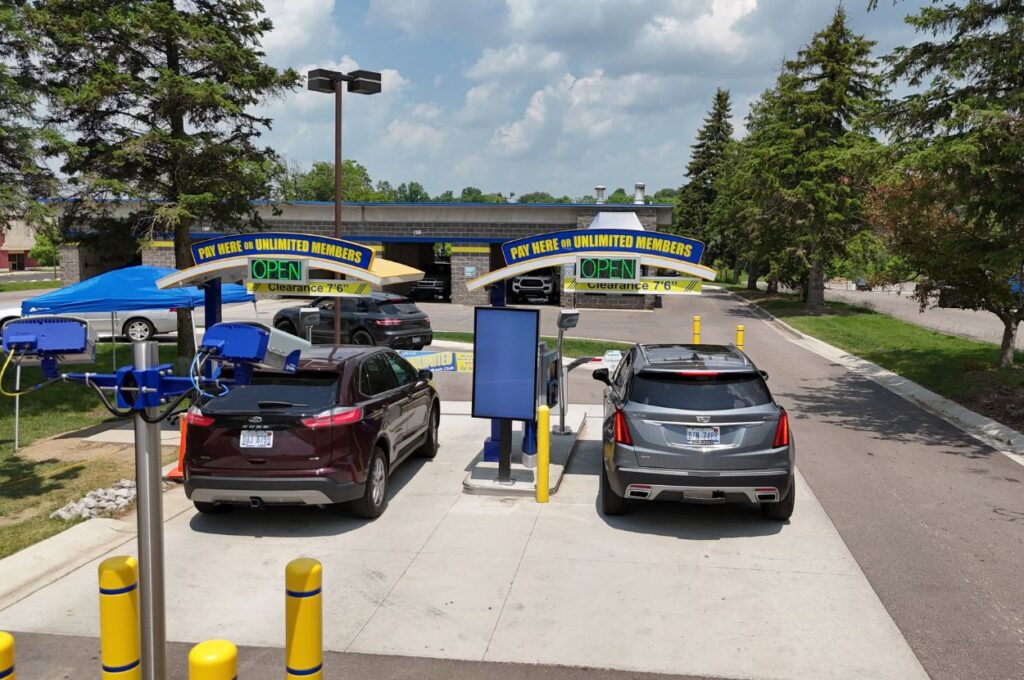 Cars entering payment lanes at Jax Kar Wash.