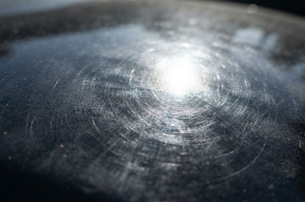Close up of swirling car scratches