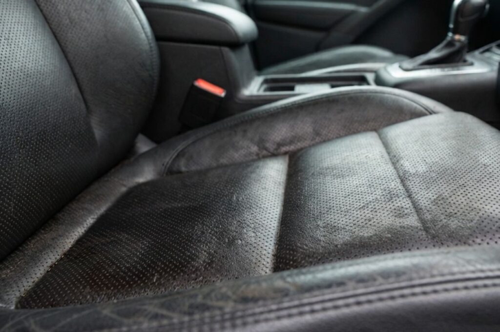 Perforated car leather seat with wet marks
