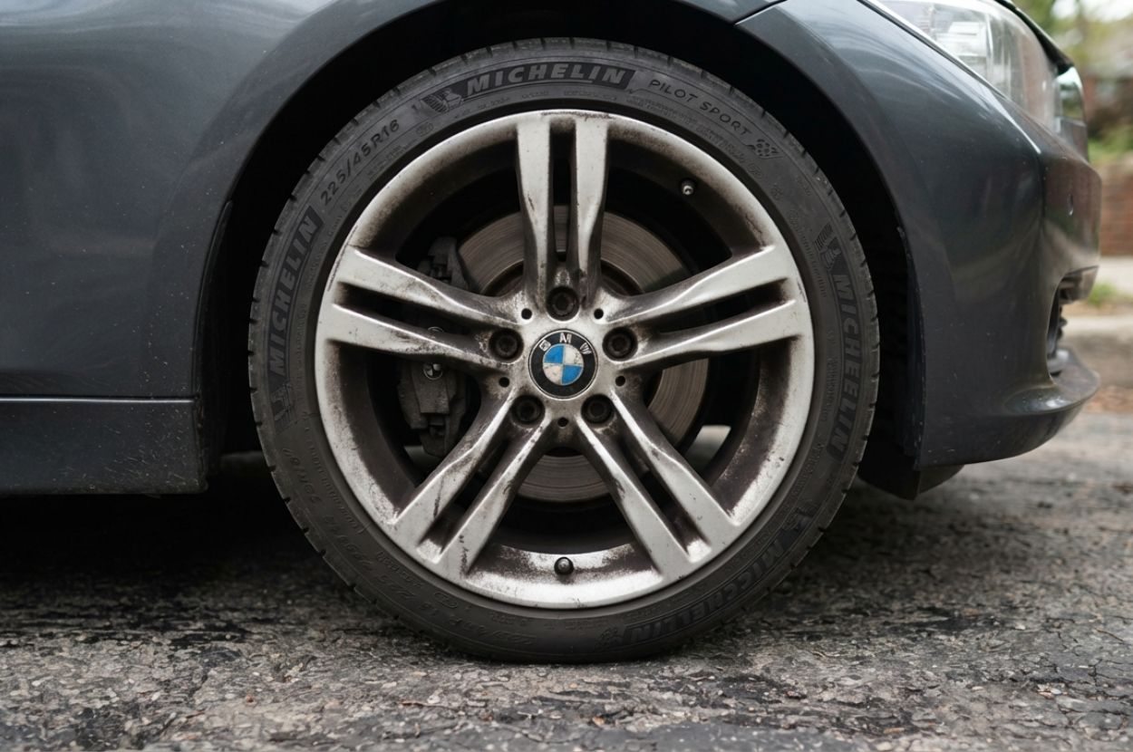 Car wheel with visible brake dust