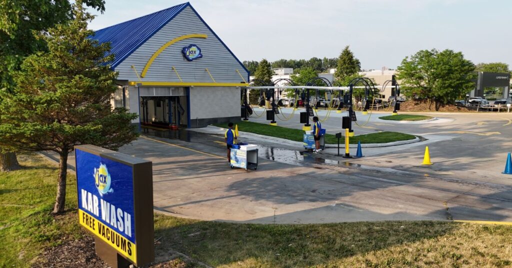 Jax Kar Wash building front with entrance and vacuum stalls.